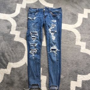 American eagle ripped jeans with fabric under it!